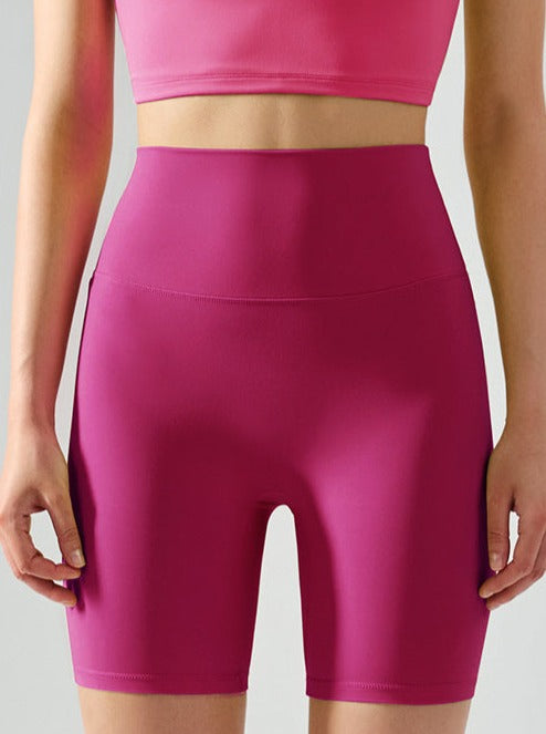 Short de yoga taille haute élastique sans couture de couleur unie 