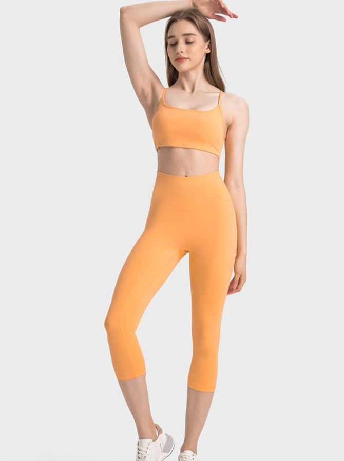 Pantalon de yoga extensible taille haute orange pour exercices